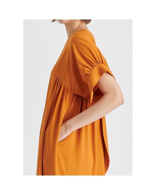 Paisie Orange Relaxed Fit Dress With Back Bow Detail