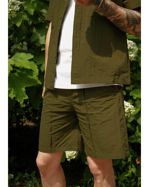 Éclectique Green Designer Casual Shorts for men
