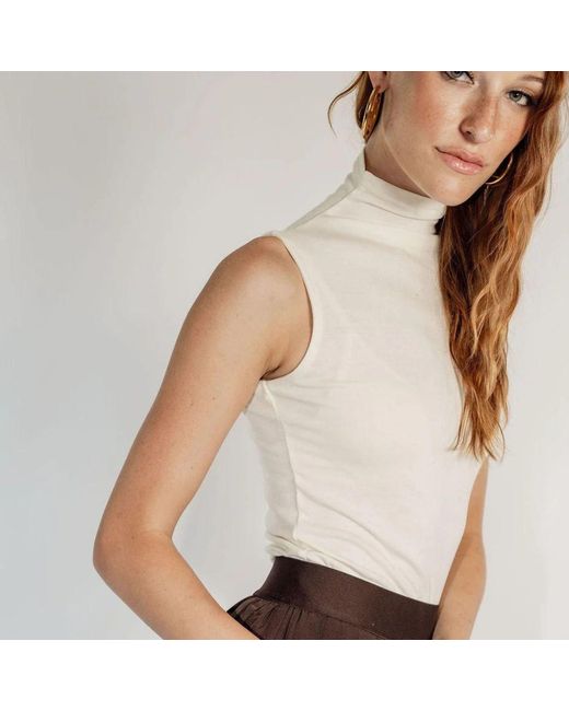 Rave on Trend White Neutrals Sleeveles Turtleneck