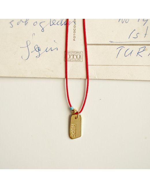 The Pheia Metallic String Hope Necklace