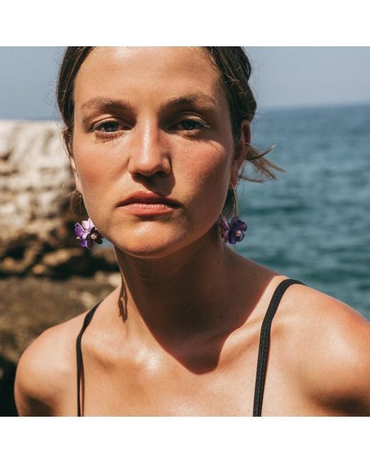 By Chavelli Purple Flowerball Dangly Earrings