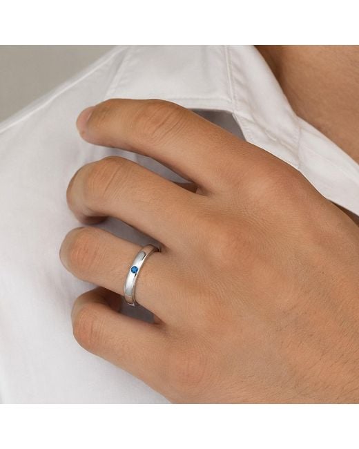 Unaloe White Smooth Sterling Band Ring With Sapphire: A Symbol Of Inner Strength for men