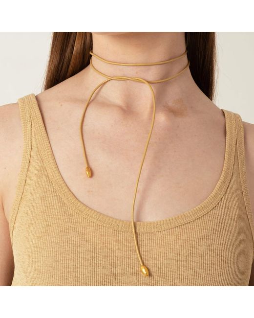 EVA REMENYI Metallic Neutrals Origin Bow Sand Necklace
