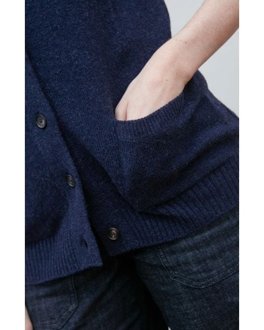 Paul James Knitwear Blue Lambswool Laura V Neck Waistcoat With Pockets