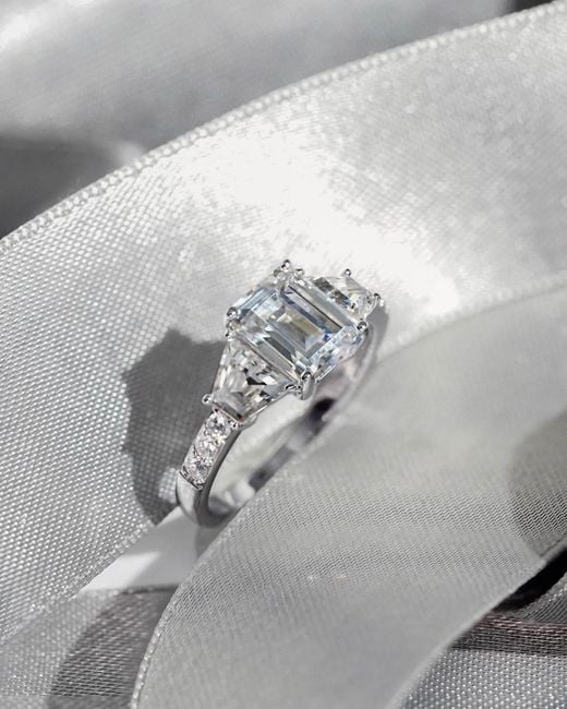 Diamonbliss White Emerald Cut With Trapeze Side Stone Engagement Ring