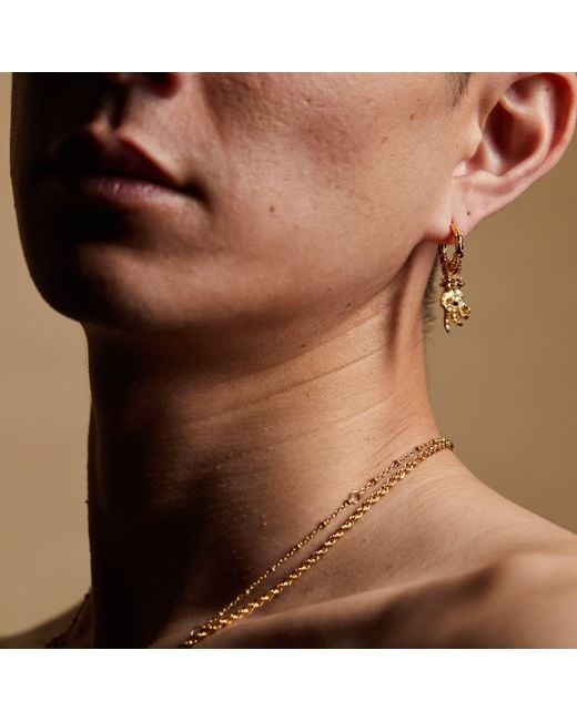 Kasun Metallic Hand Of The Protector Earrings for men