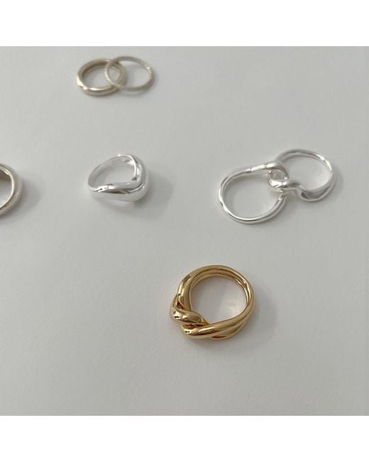 Cote Cache Metallic Unity Ring