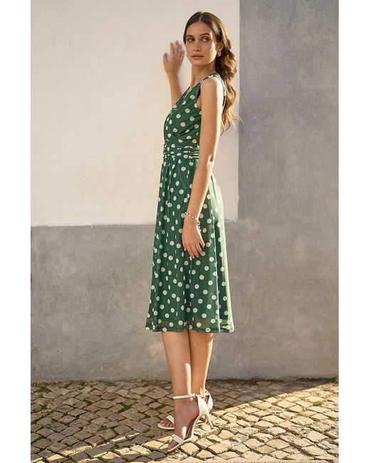 Yumi' Green Polka Dot Mesh Wrap Skater Dress With Pockets