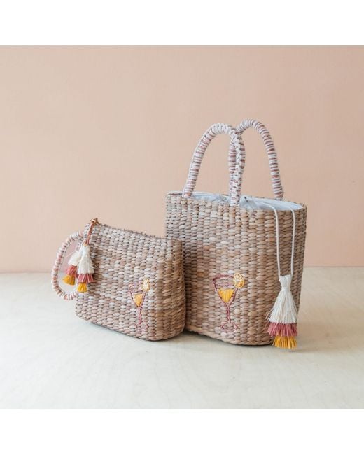 LIKHÂ Orange Neutrals Handwoven Seagrass Cocktail Tote Bag With Tassels