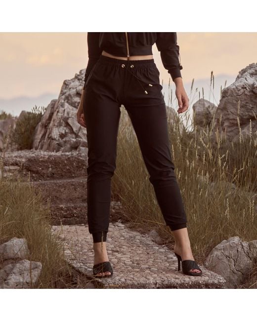 ANTONINIAS Blue Elegant Sweat Pants With Golden Details
