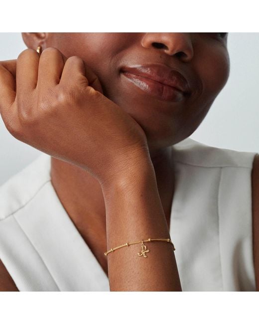 Muru Metallic Bow Bracelet