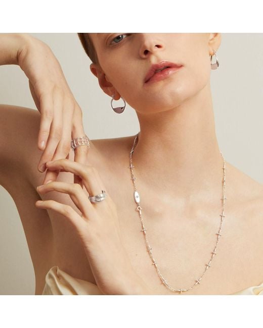 Cote Cache Metallic Cross Necklace