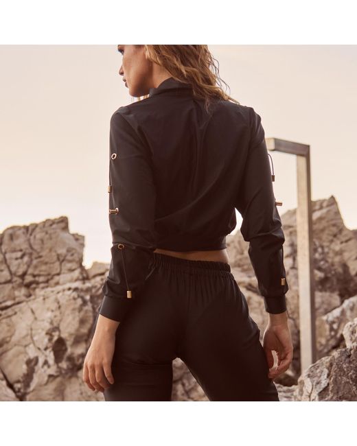 ANTONINIAS Black Fitcy Top With Golden Details In
