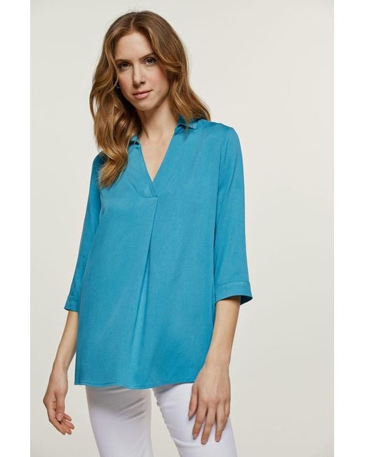 Conquista Blue V Neck Top
