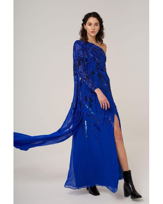 Raishma Blue Astrid A One Shoulder With A Dramatic To-The-Floor Draped Georgette Train, Falling From The Shoulder Gown