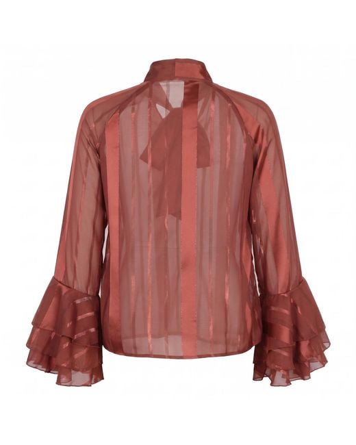 Modenaire Red Sheer Blouse With Tie Neck Detail And Bell Sleeves