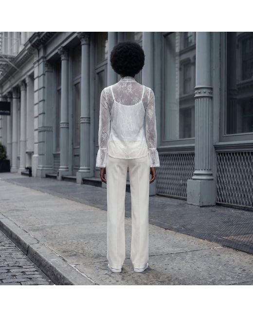 Modenaire White Sheer Lace Blouse With Bow Tie Neck Ruffle Front Detail With Cami