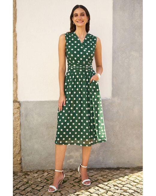 Yumi' Green Polka Dot Mesh Wrap Skater Dress With Pockets