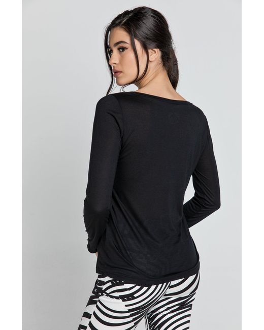 Conquista Black V Neck Top By Swl