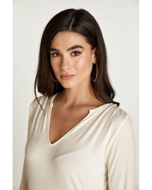 Conquista White Neutrals Cream Jersey V Neck Top