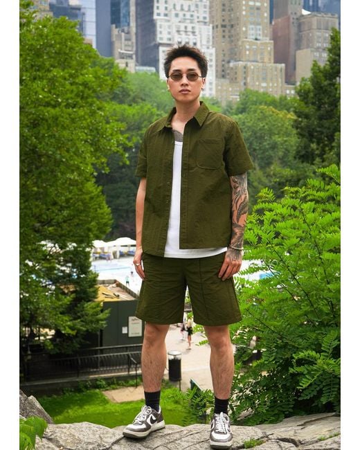Éclectique Green Designer Casual Shorts for men