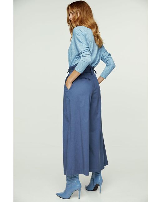 Conquista Blue Light Melange Knit Handkerchief Hem Top