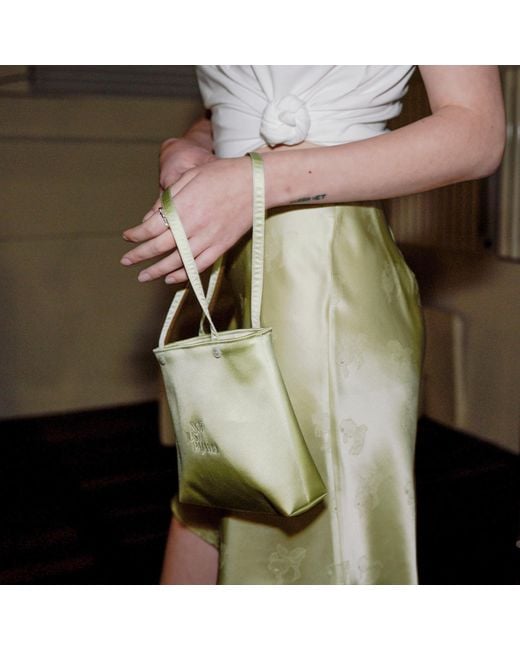 NOT JUST PAJAMA Green Glam Silk Handbag With Feathers