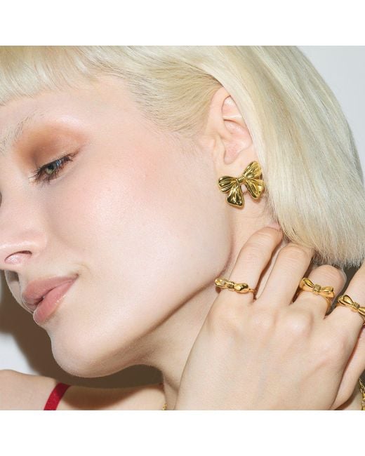 Amadeus Metallic Bow Stud Earrings