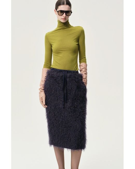 FRONT ROW SHOP Green Open-Back Wool Jersey Top