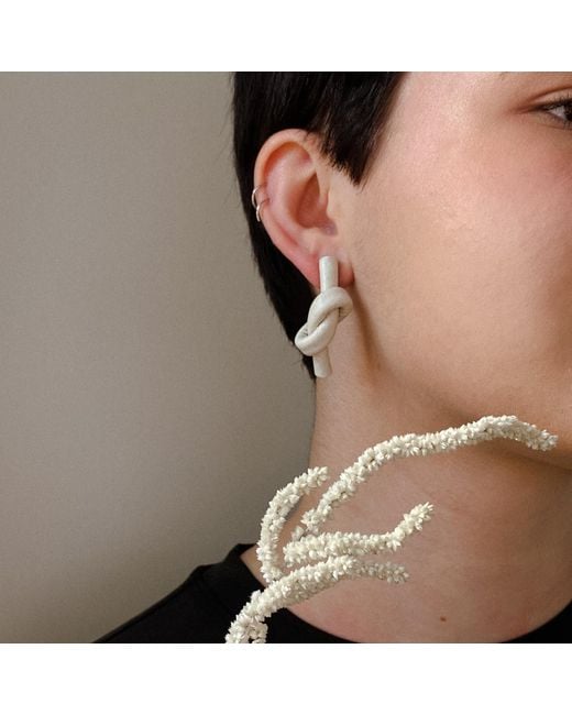 WAIWAI Metallic Ivory Knot Leather Earrings