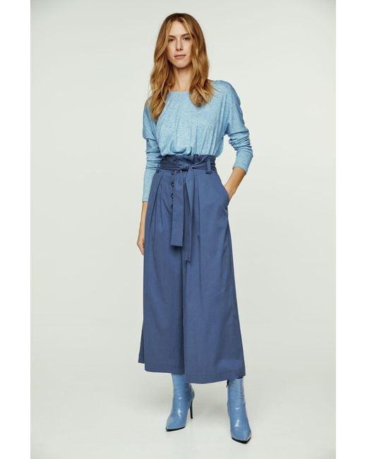 Conquista Blue Light Melange Knit Handkerchief Hem Top