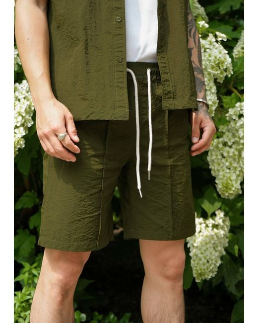 Éclectique Green Designer Casual Shorts for men