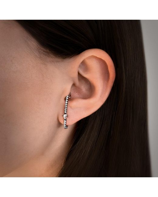 SALLY SKOUFIS White Revolution Huggie Earrings With Made Cz Diamond Stimulant