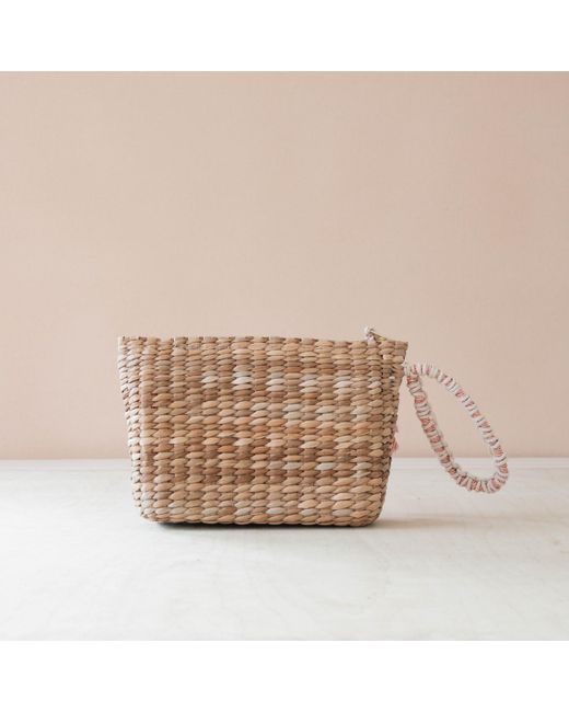 LIKHÂ Brown Neutrals Handwoven Seagrass Bunny Wristlet Pouch With Tassels