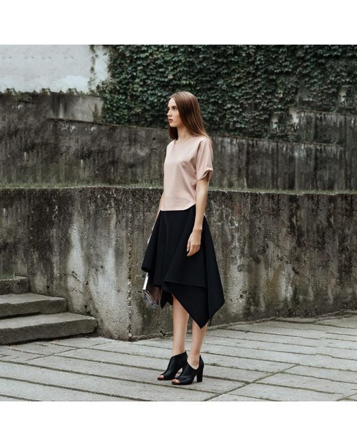 Laura Daili Black Sharp Midi Skirt