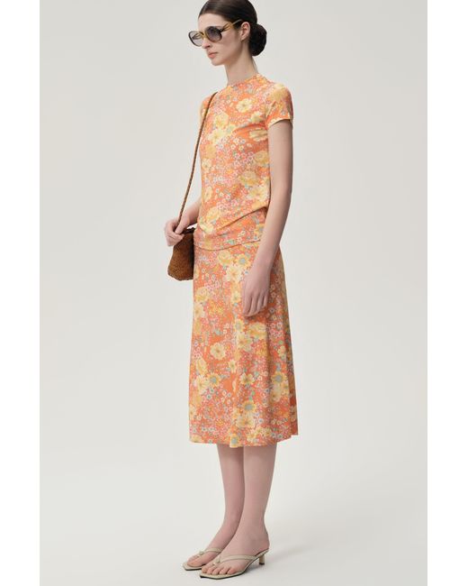 FRONT ROW SHOP Orange Daisy Viscose Jersey Midi Skirt