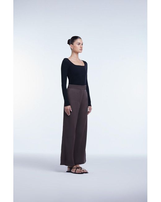 Dāl the Label Blue Ribbed Long Sleeve Bodysuit