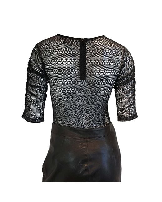 SNIDER Black Biscuit Short Sleeve Top
