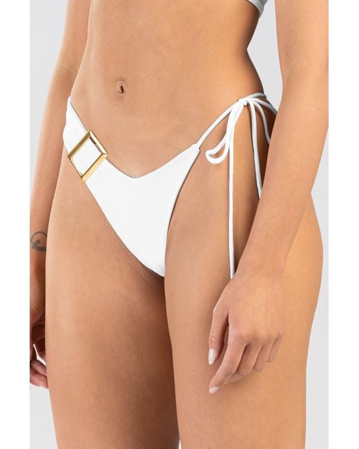 ANTONINIAS White Dulcet Double Layered Asymmetric Bikini Bottom With Golden Details