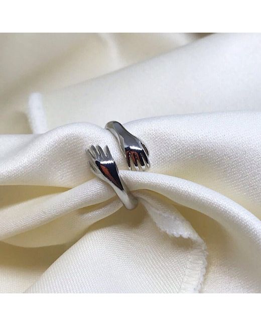 Spero London Metallic Hug Ring With Hands Sterling
