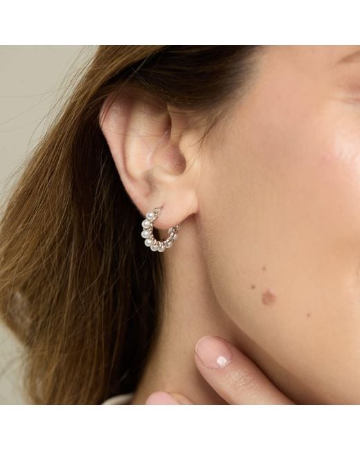 Pearls of the Orient Online Metallic Gratia Sterling Huggie Hoop Earrings With Delicate Mother Of Pearl Beads