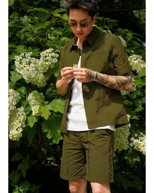Éclectique Green Designer Casual Shorts for men