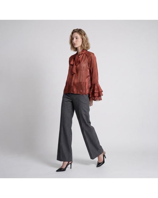 Modenaire Red Sheer Blouse With Tie Neck Detail And Bell Sleeves