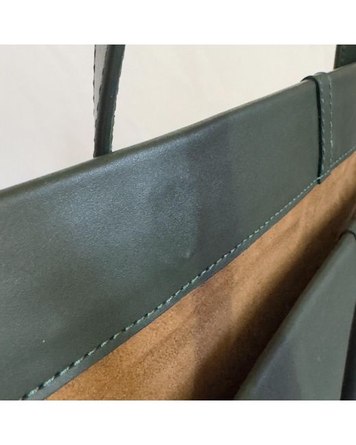 godi. Black The Roon Top Handle Leather Bag