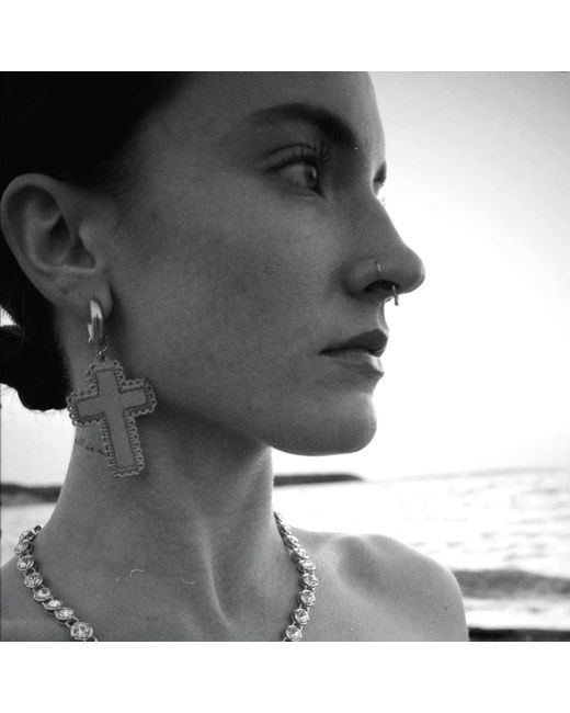 Madonna cross earrings discount