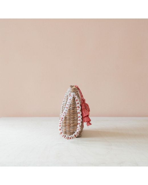 LIKHÂ Red Neutrals Handwoven Seagrass Tomato Wristlet Pouch With Tassels