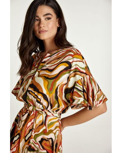 Conquista Brown Brick Colour Print Dress With Ruffle Sleeves