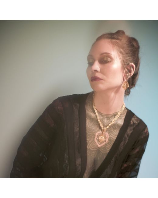 IN CAUDA VENENUM Metallic Akasha Earrings