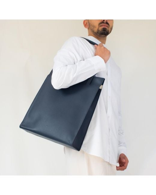 godi. Blue Handmade Adjustable Leather Tote Bag for men