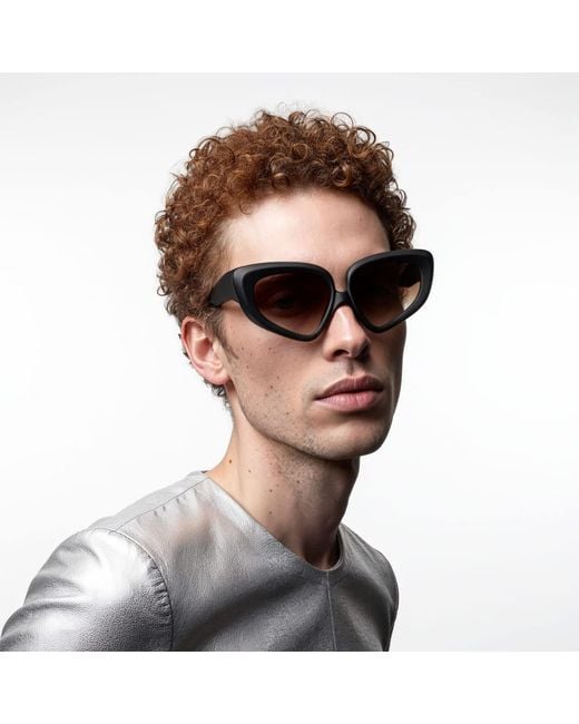 Loop and Egg Brown Sunglasses L A G Two Dark